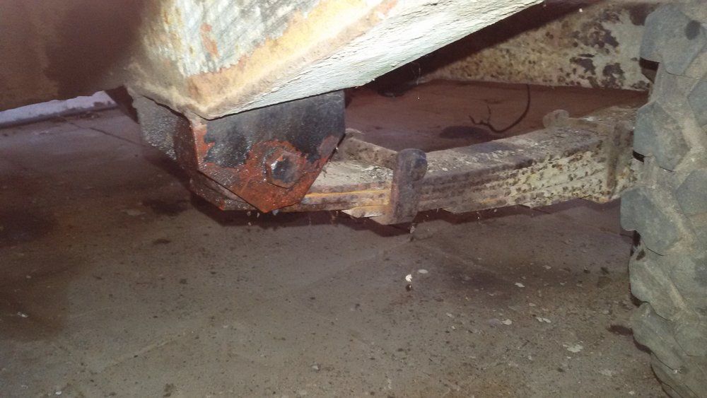 1965 series 2a station wagon front bolts on rear spring stuck.jpg