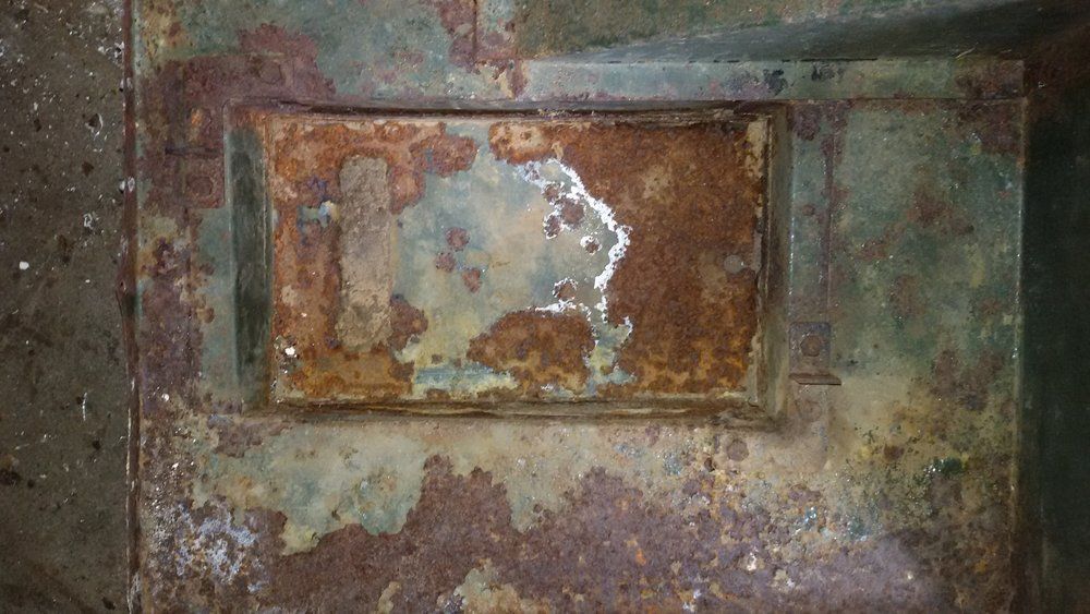 1965 series 2a station wagon rust in the bottom of the under seat battery tray.jpg